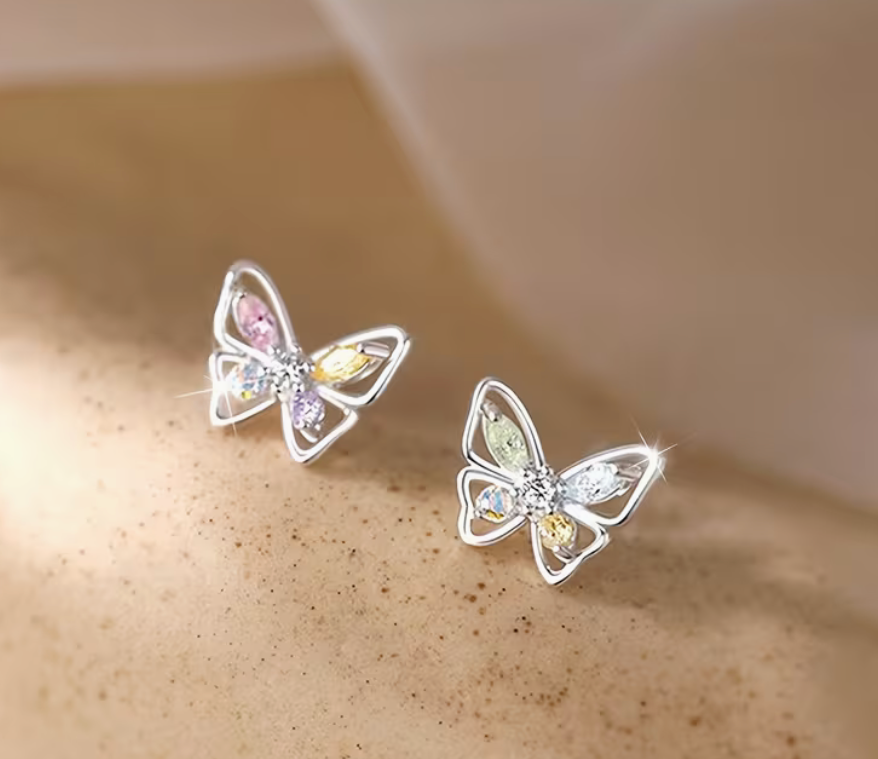Silver-tone butterfly stud earrings with sparkling pastel pink yellow lavender green and iridescent stones