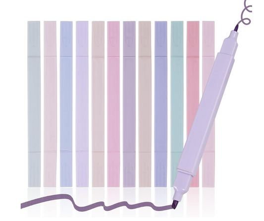 pastel dual tip markers standing in a row with one marker drawing a curved line