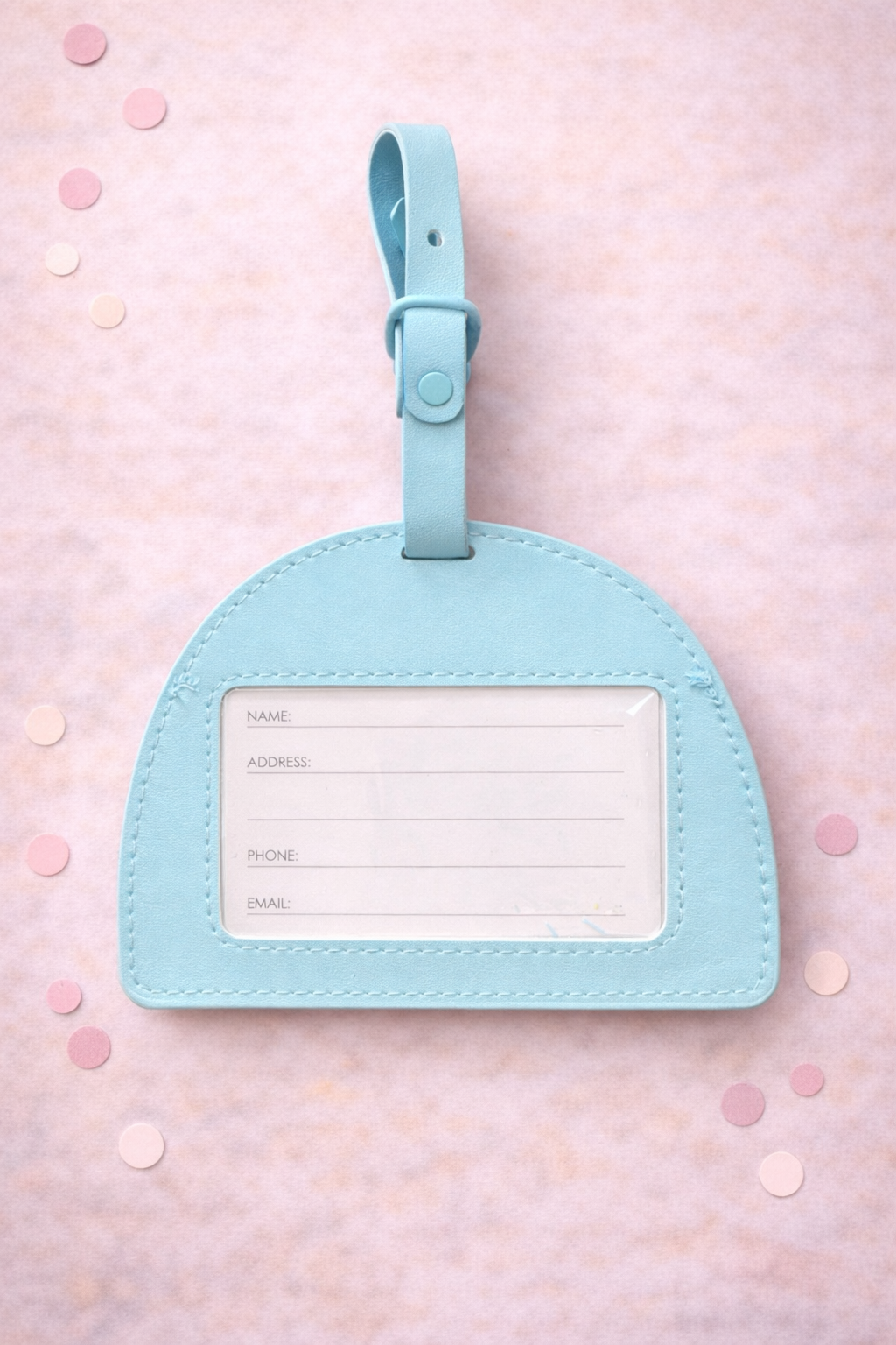 Back view of pastel rainbow luggage tag showing ID window for contact information