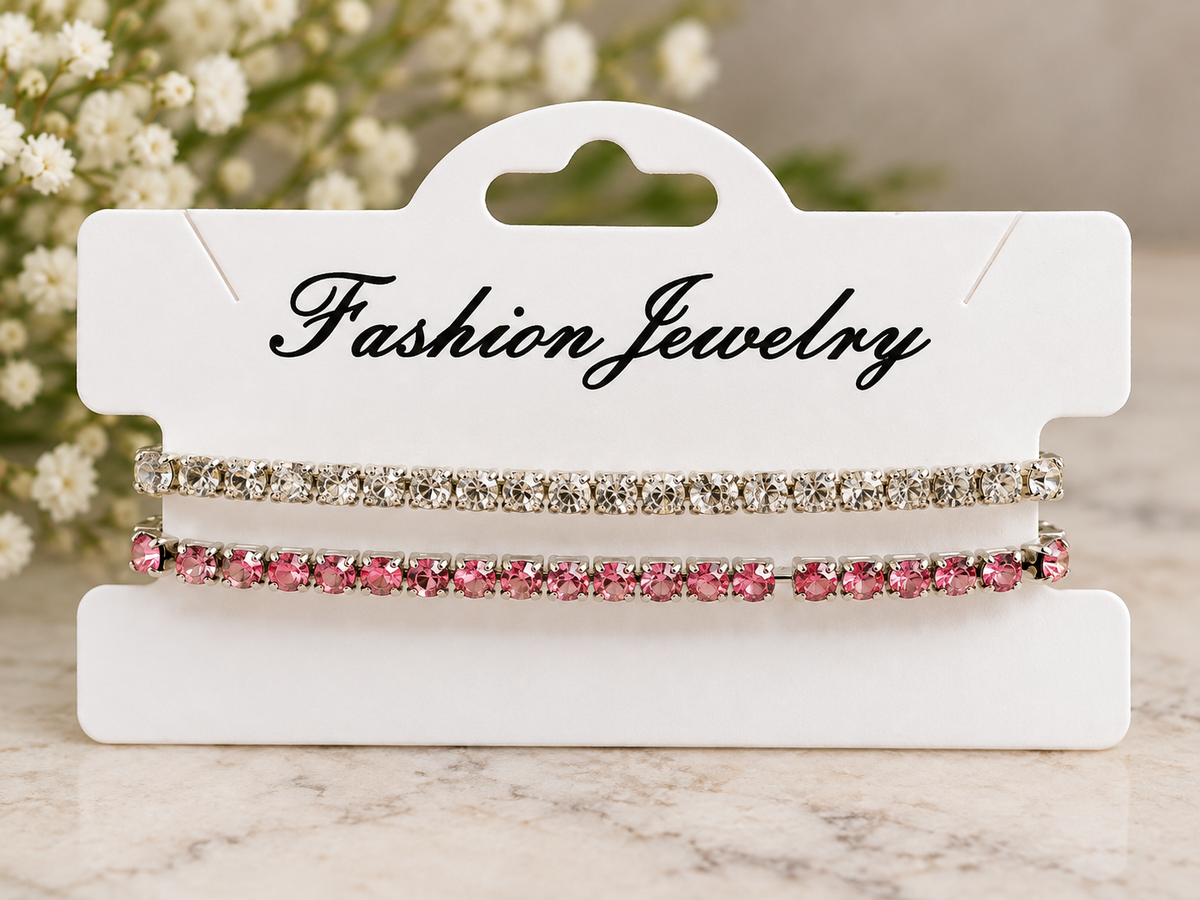 Set of two stretchy rhinestone bracelets with sparkling clear and pink stones