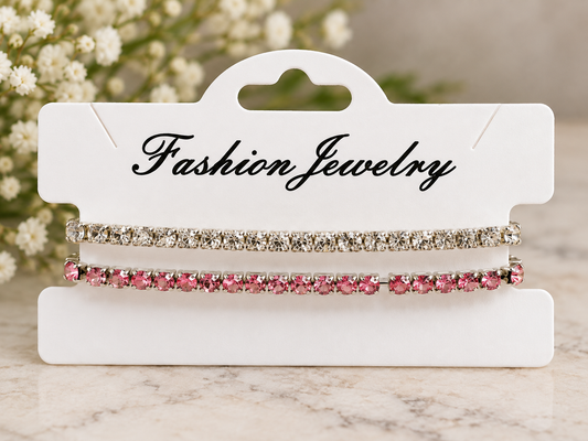 Set of two stretchy rhinestone bracelets with sparkling clear and pink stones