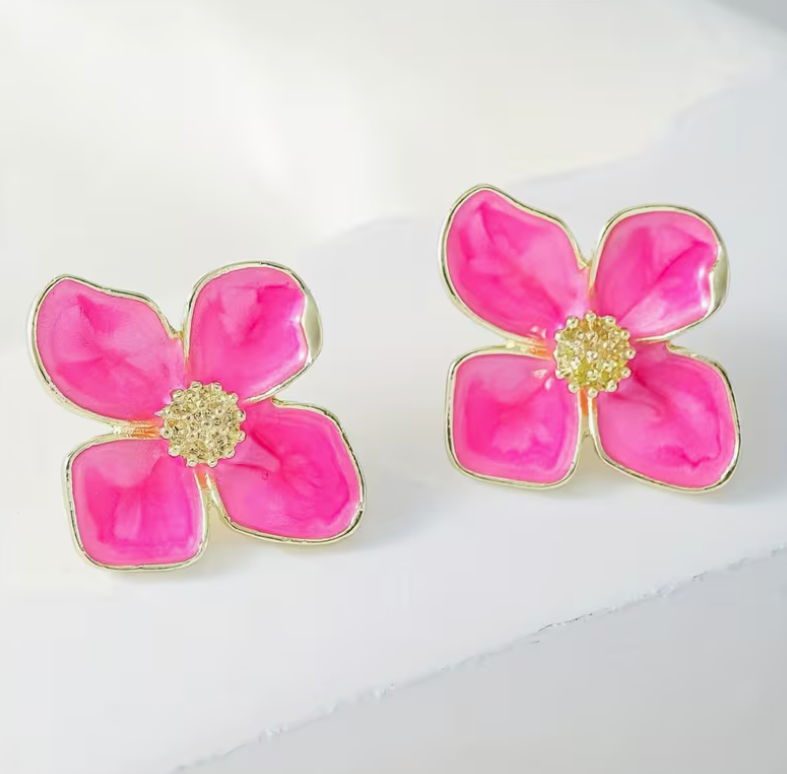 Bright pink four petal flower stud earrings with gold trim and glossy enamel finish