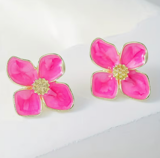 Bright pink four petal flower stud earrings with gold trim and glossy enamel finish