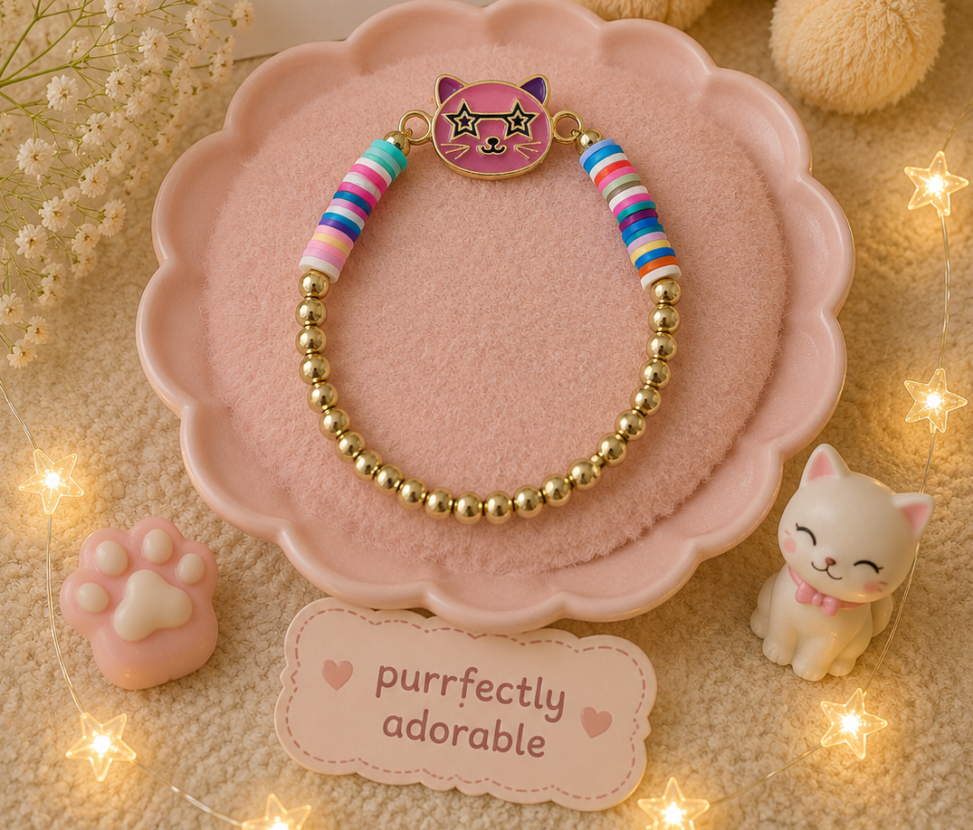 Pink cat bracelet with star sunglasses charm, colorful pastel beads, and gold-tone elastic beads