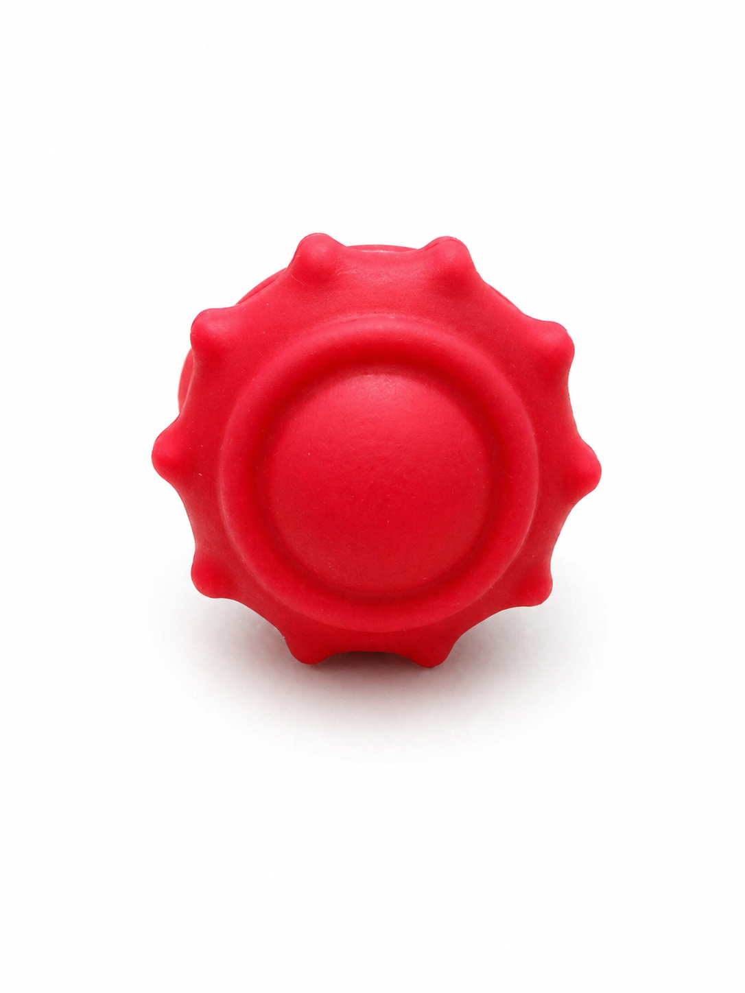Pink silicone fidget ring with smooth center and textured outer edge