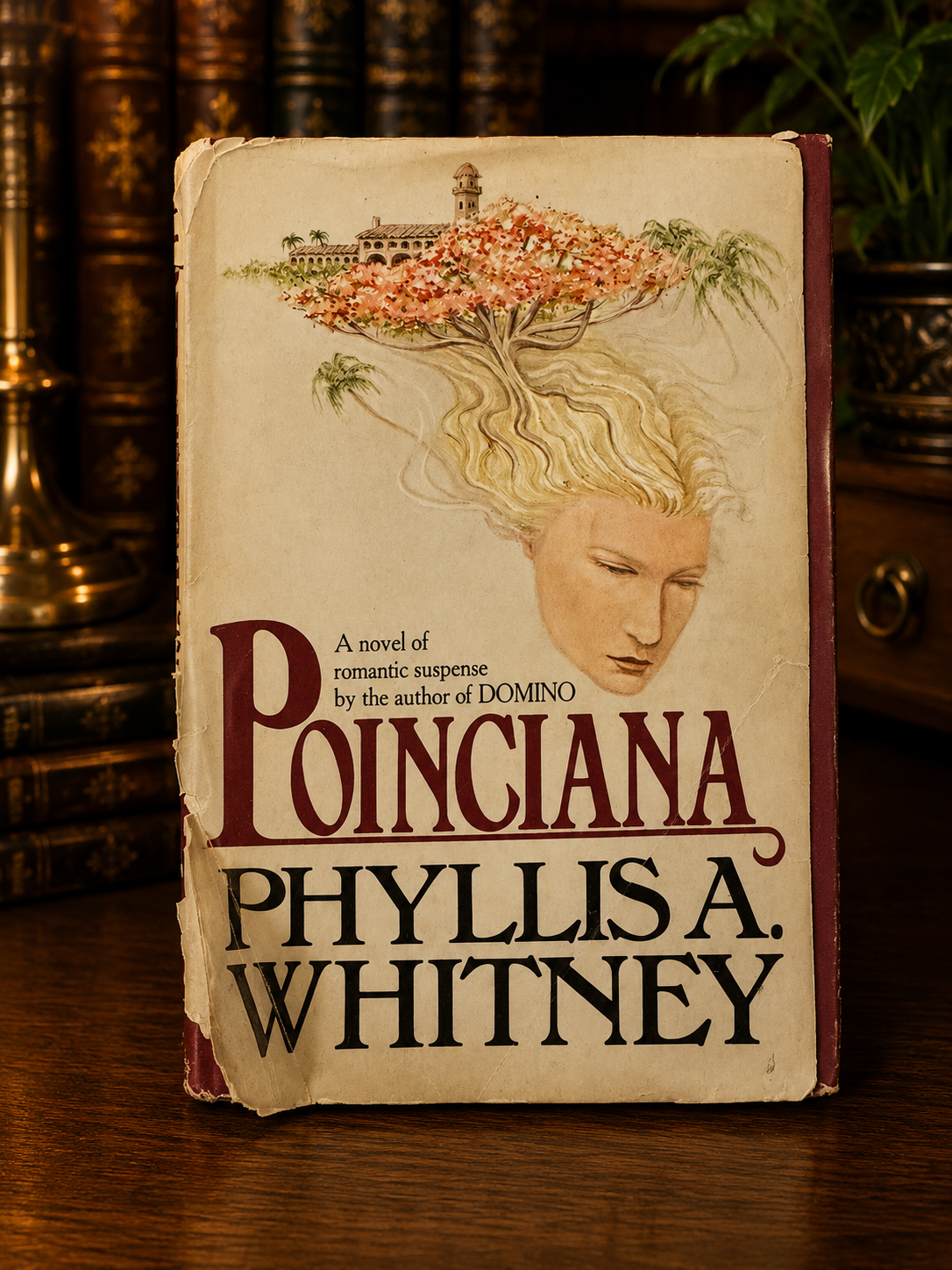 Front cover of Poinciana by Phyllis A. Whitney in worn original dust jacket.