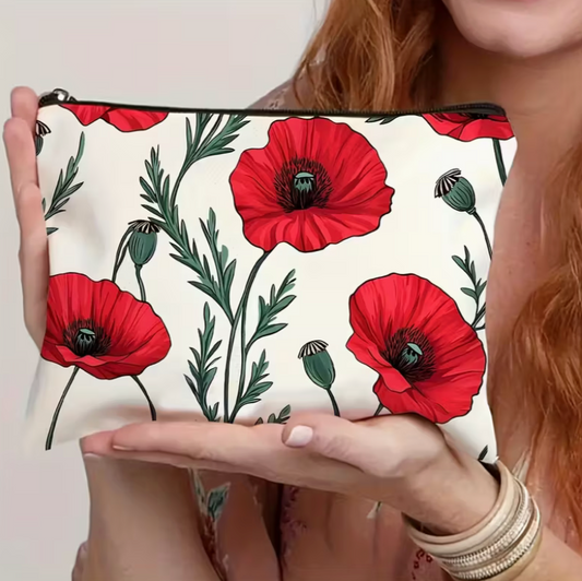 makeup bag featuring vibrant red poppy flowers and botanical floral artwork on a white zipper cosmetic pouch