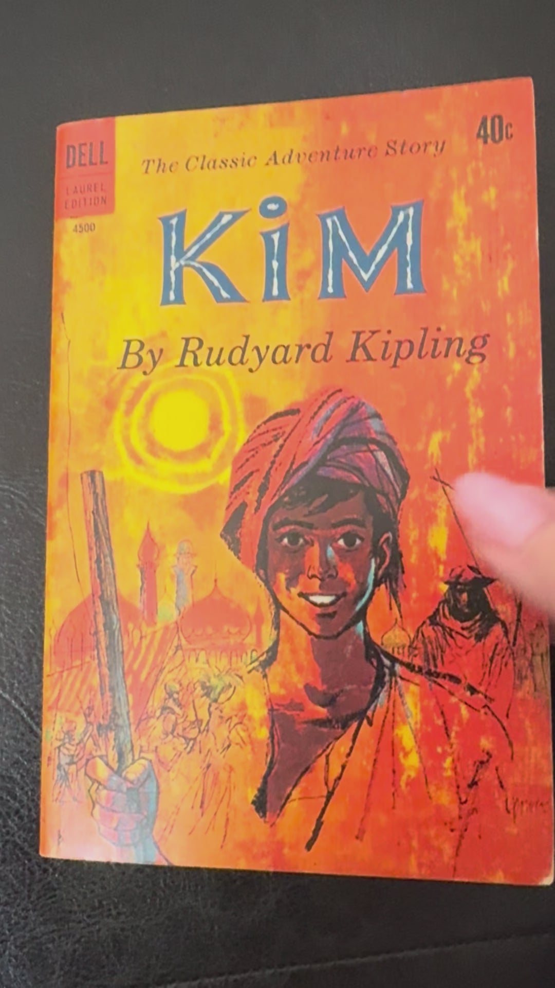 Vintage 1963 Dell Laurel Edition paperback of Kim by Rudyard Kipling featuring colorful adventure-themed cover artwork