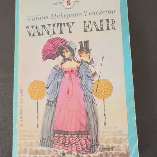 Vintage Signet Classics paperback edition of Vanity Fair by William Makepeace Thackeray featuring illustrated Victorian cover art