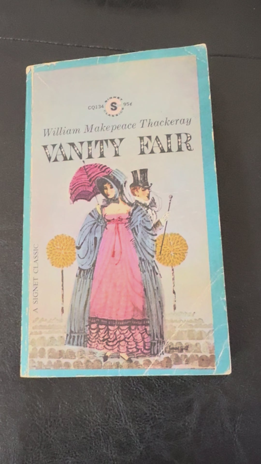 Vintage Signet Classics paperback edition of Vanity Fair by William Makepeace Thackeray featuring illustrated Victorian cover art