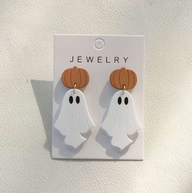 Brown pumpkin stud earrings with white acrylic ghost dangle pendants