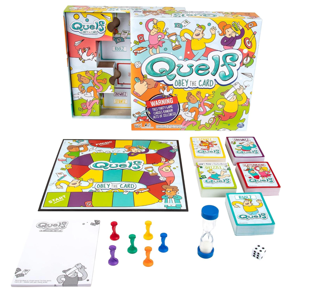 Quelf Obey the Card party game with game board, cards, timer, die, and playing pieces.