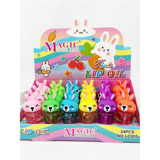 Moisturizing rabbit lip oil with fruity scent and bunny cap. Sold individually in assorted colors. Lightweight, silky lip oil perfect for gifts and everyday use.