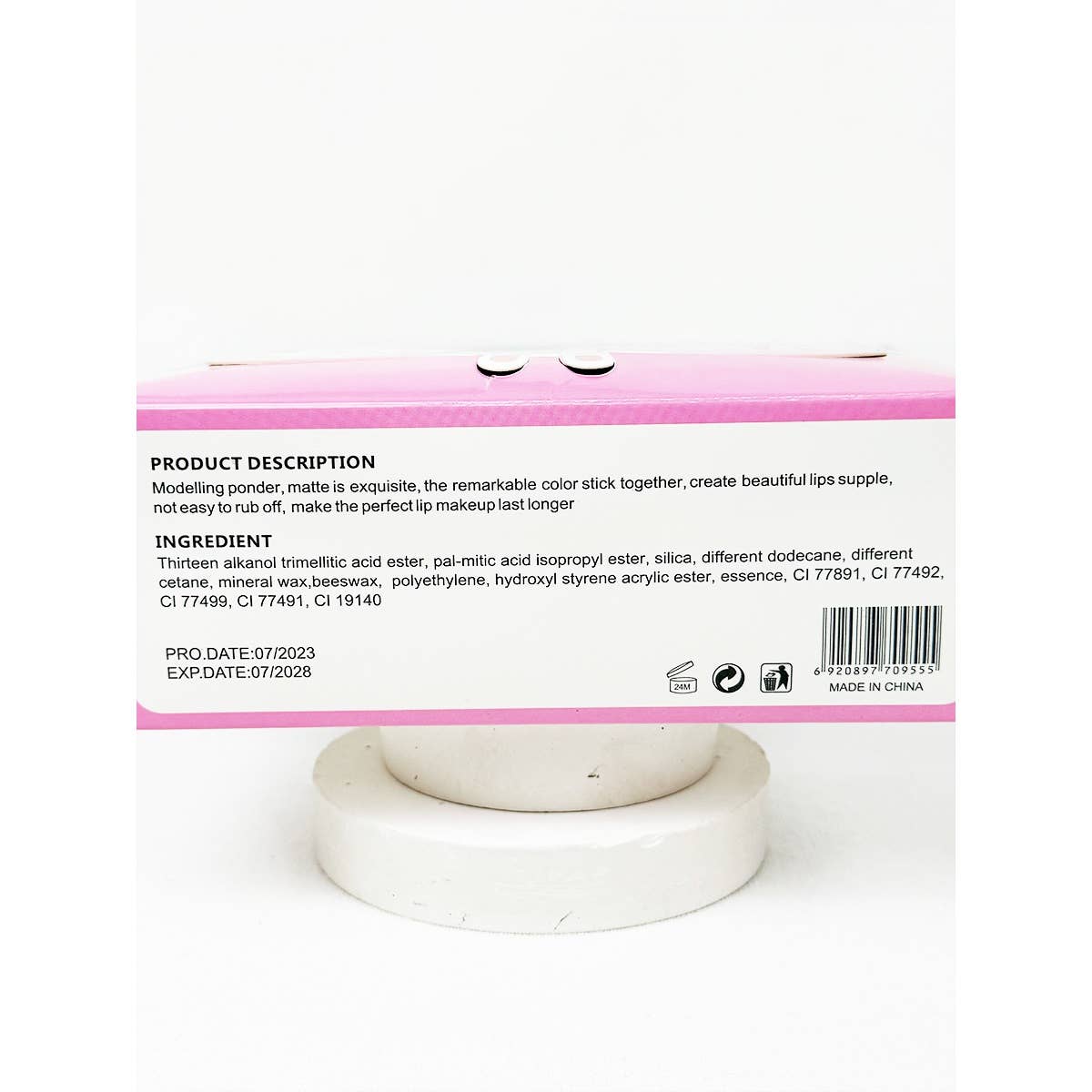Back of rabbit lip oil packaging showing product description, ingredient list, production date July 2023, expiration date July 2028, and made in China label