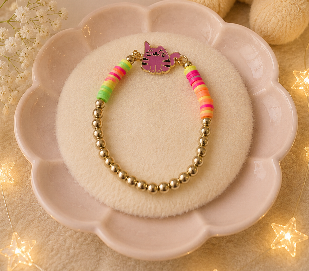Rainbow striped kitten bracelet with pink cat charm and gold-tone beads