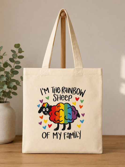 Canvas reusable shopping tote bag featuring a rainbow sheep and the phrase I’m the Rainbow Sheep of My Family surrounded by colorful hearts