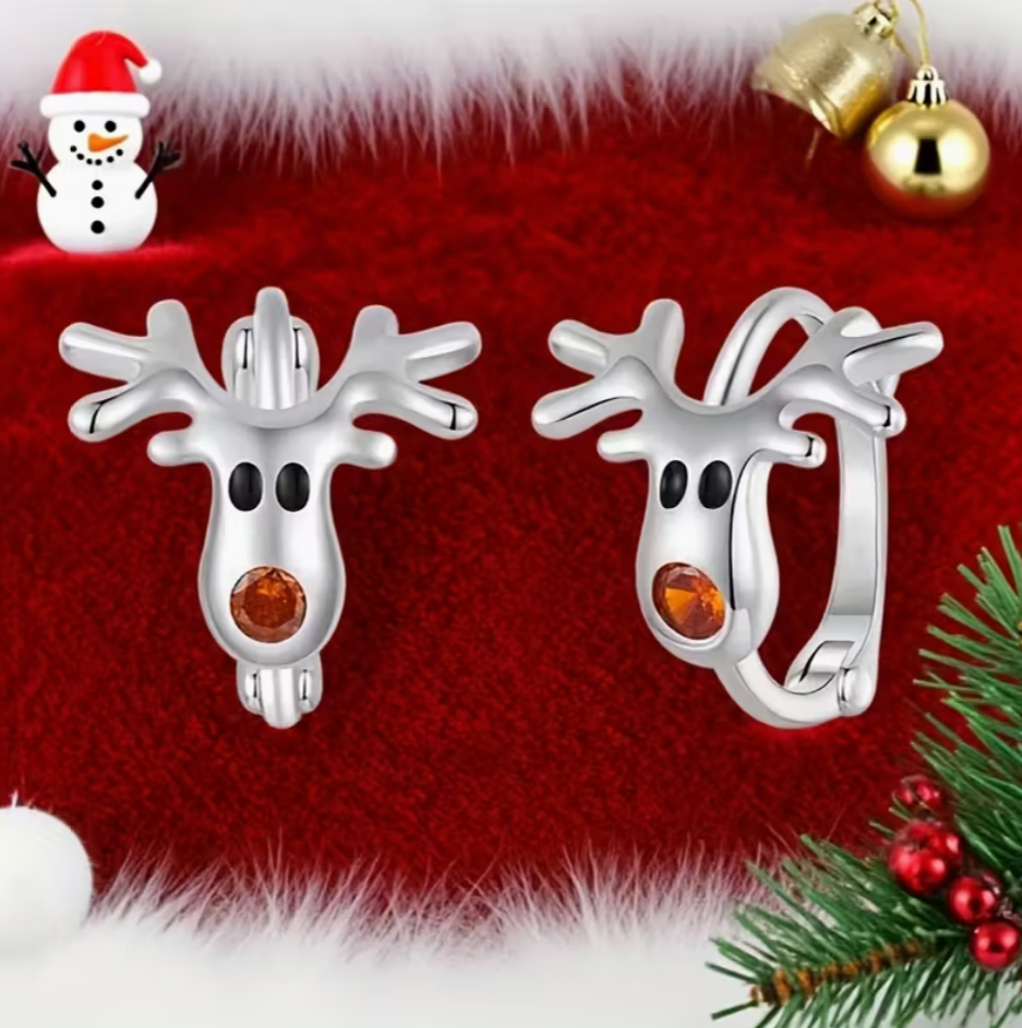 Silver-tone reindeer hoop earrings with antlers and an orange nose shown against a light background.