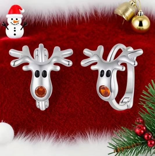 Silver-tone reindeer hoop earrings with antlers and an orange nose shown against a light background.
