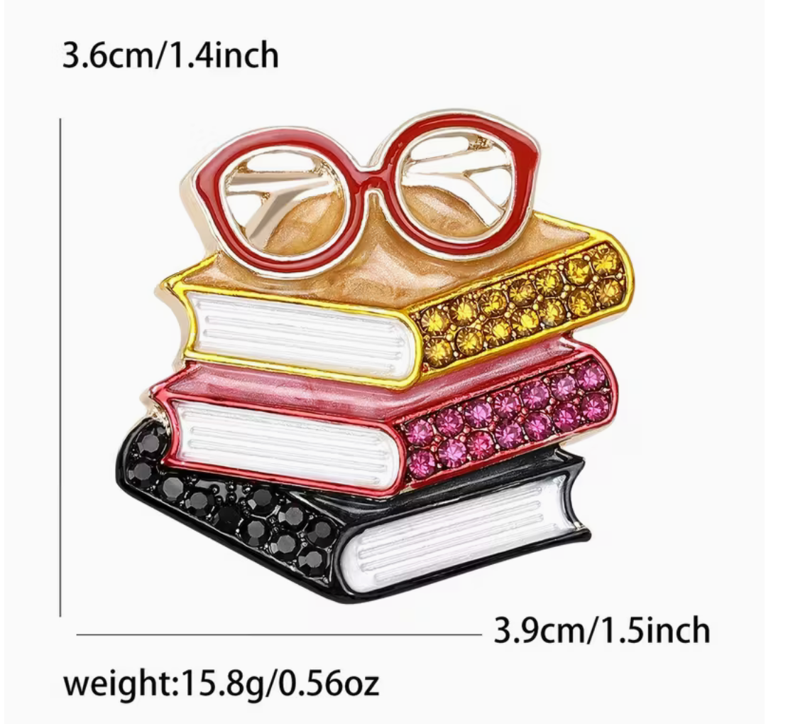 A decorative stack of four books with oversized round eyeglasses on top, shown on a white background with printed dimensions and weight: 3.6cm/1.