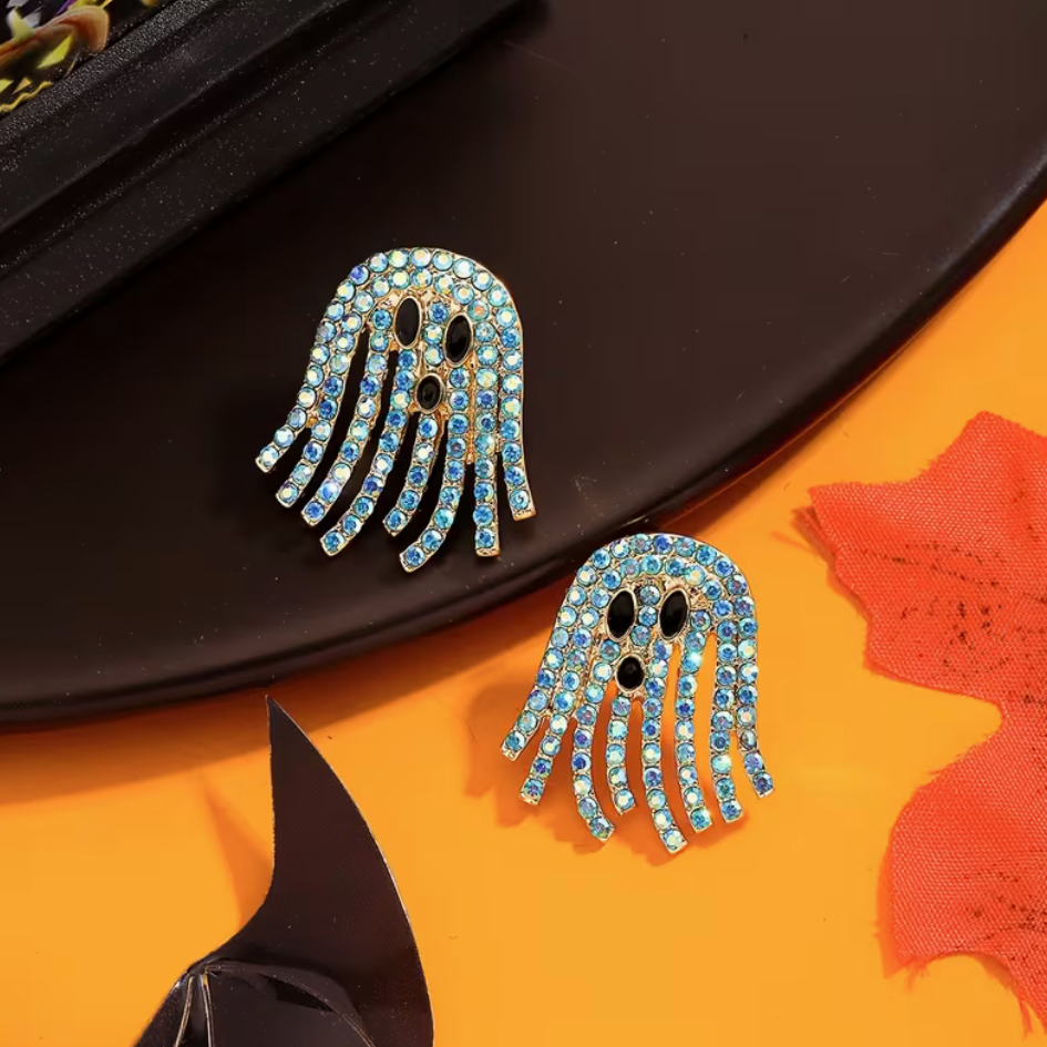 Pair of sparkling rhinestone ghost earrings with black eyes and dangling wavy details