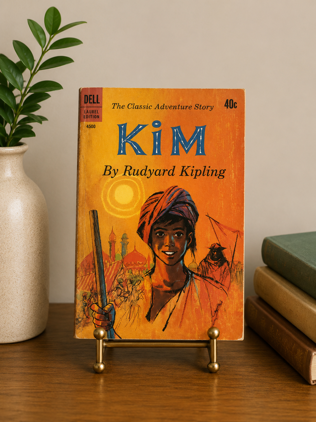Vintage 1963 Dell Laurel Edition paperback of Kim by Rudyard Kipling featuring colorful adventure-themed cover artwork