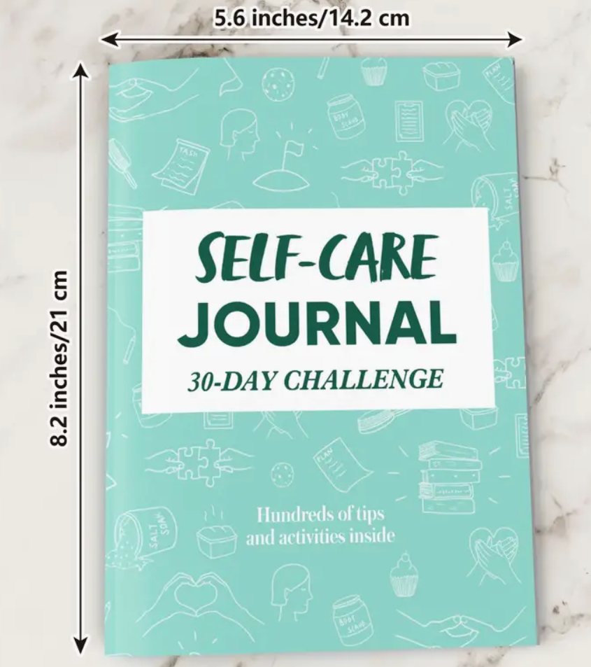 30-day self-care journal open to pages for reflection, mood tracking, sleep log, and daily self-love prompts.