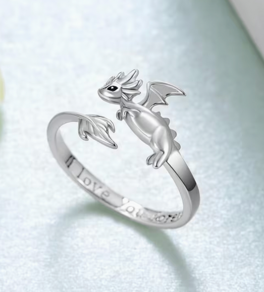 Silver adjustable dragon ring with detailed wings and engraved I Love You Forever text shown on a light background