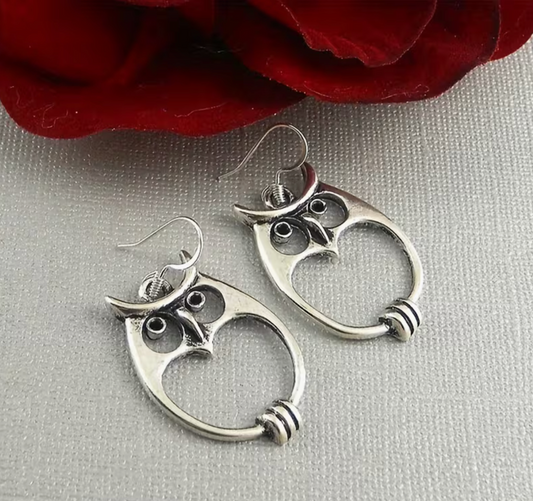 Silvery bohemian owl pendant earrings with lightweight vintage-inspired design