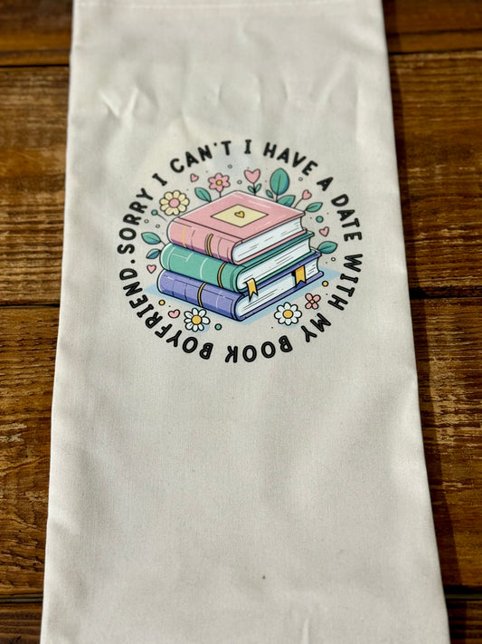 Reusable wine gift bag with the phrase Sorry I Can’t, I Have a Date with My Book Boyfriend, perfect for book lovers.