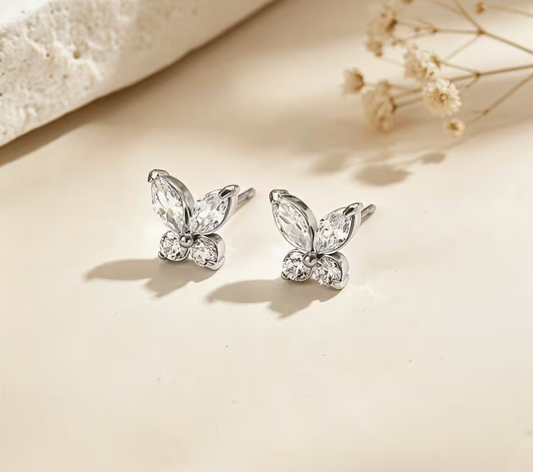 Silver-tone butterfly stud earrings with sparkling clear faceted crystal-style stones