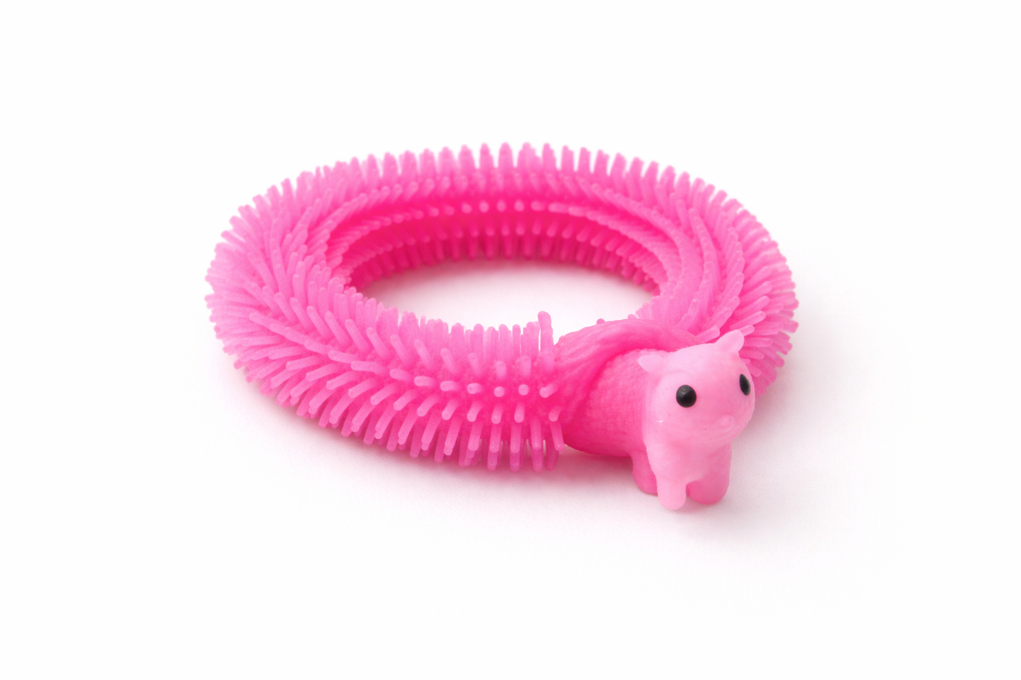 Bright pink stretchy spiky fidget toy shaped like a llama, shown coiled into bracelet form, sensory toy for kids and teens.