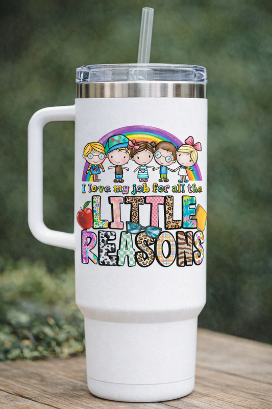 White handled tumbler with straw featuring colorful I love my job for all the little reasons teacher decal with children and rainbow design