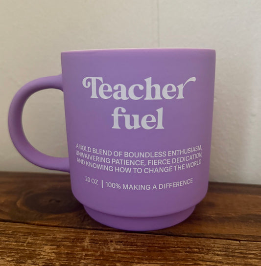 Lavender ceramic mug with white text that reads Teacher Fuel and a message about educator dedication and impact