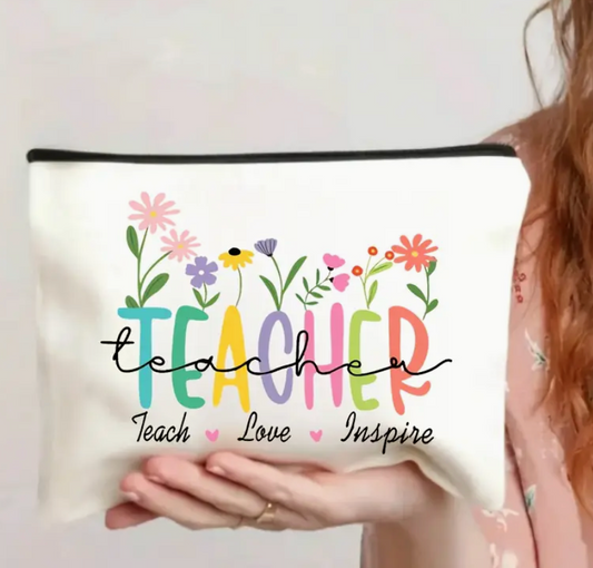 Canvas accessories pouch with the phrase Teacher: Teach, Love, Inspire printed in stylish lettering—perfect for organizing supplies and showing appreciation.