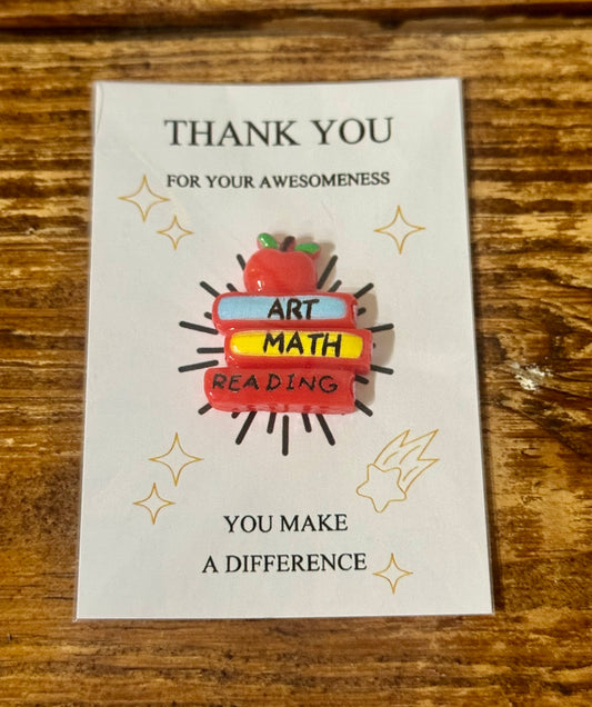  Pocket hug shaped like a stack of textbooks with the message You Make a Difference engraved—perfect for teacher appreciation.