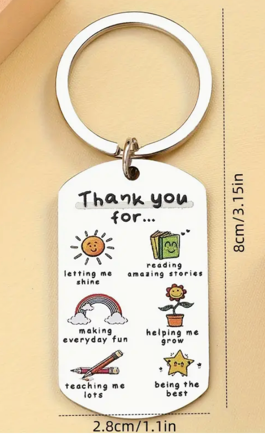 Metal keychain engraved with the phrase Teachers Plant Seeds That Grow Forever—a meaningful and lasting gift for educators.