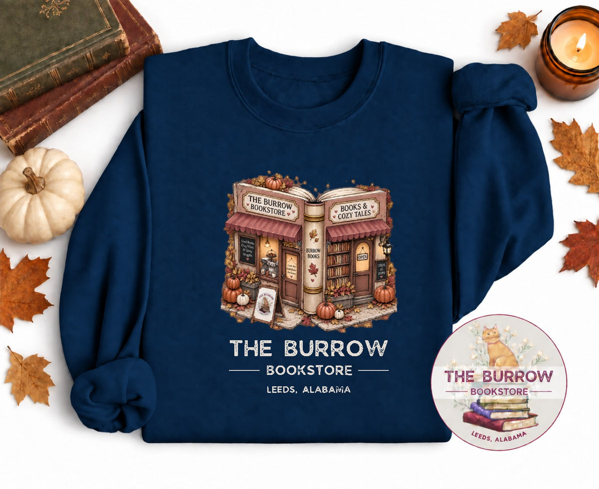 Navy The Burrow Bookstore fall sweatshirt with cozy autumn bookstore and pumpkin design