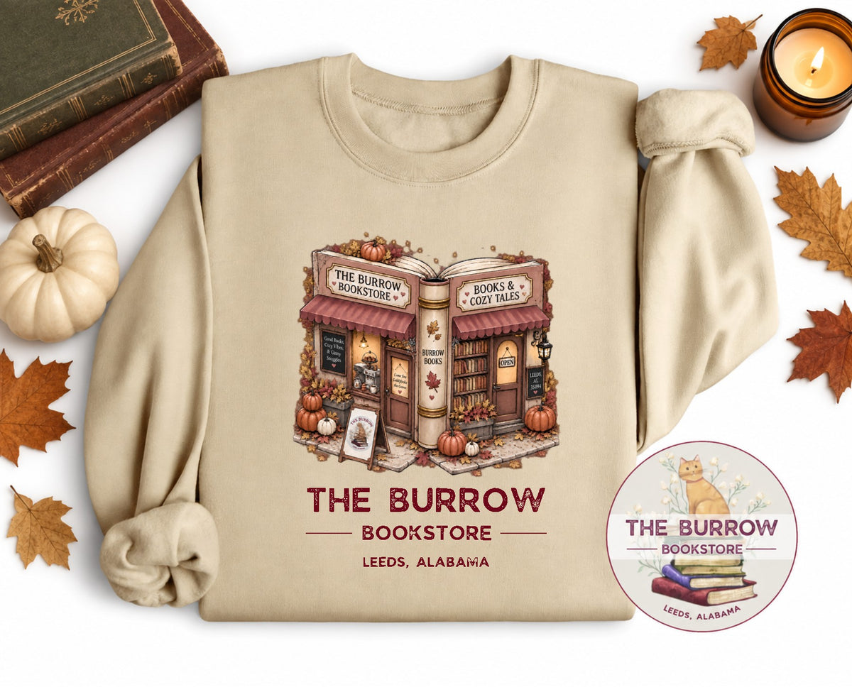 Sand The Burrow Bookstore fall sweatshirt with cozy autumn bookstore and pumpkin design