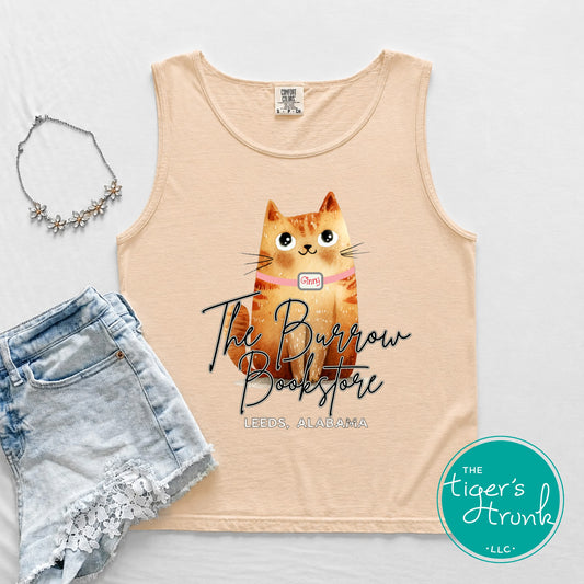 Natural-colored unisex tank top featuring Ginny the bookstore cat and The Burrow Bookstore logo from Leeds, Alabama.