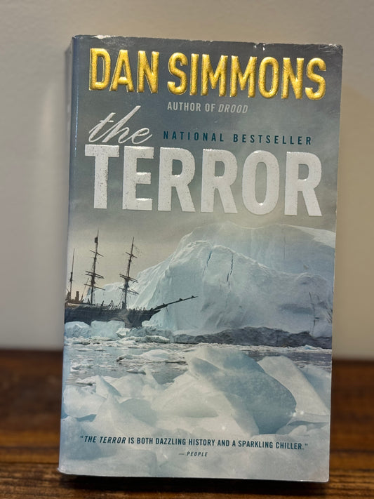 Paperback copy of Dan Simmons’ The Terror in like new condition, a historical horror novel.