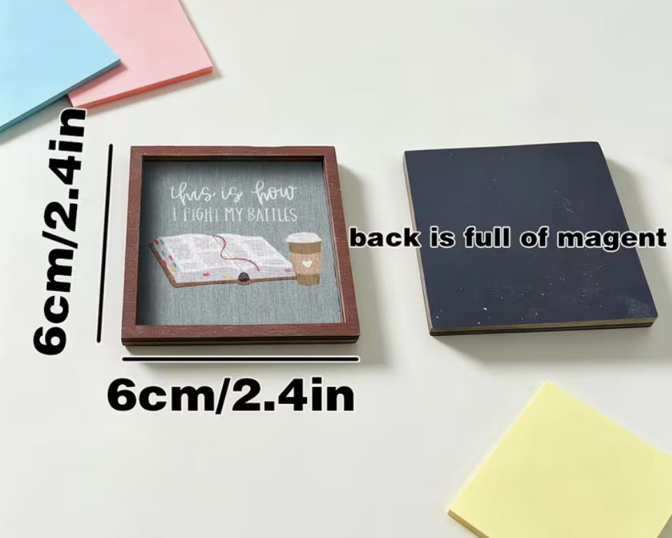 A small square decorative plaque or coaster shown on a white surface with measurement labels indicating 6cm/2.4in on two sides.