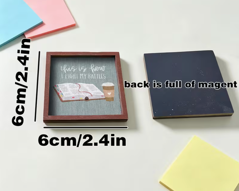 A small square decorative plaque or coaster shown on a white surface with measurement labels indicating 6cm/2.4in on two sides.