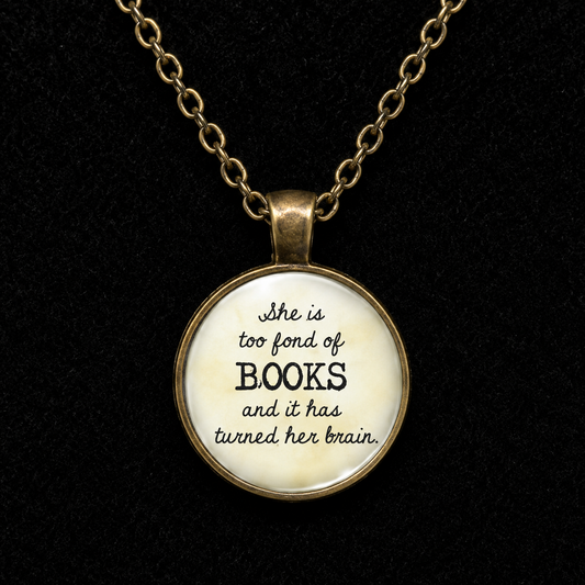 Vintage bronze-tone book lover necklace featuring She Is Too Fond of Books quote in a round glass pendant with matching chain.