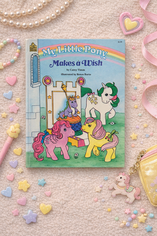 Vintage 1986 My Little Pony Makes a Wish children’s book cover with pastel ponies and rainbow design styled with nostalgic accessories
