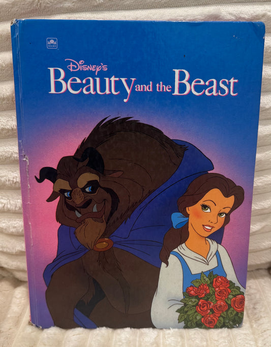 Vintage 1991 Disney Beauty and the Beast children’s book cover featuring Belle and Beast in classic animated style