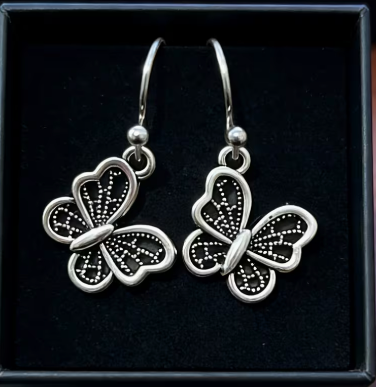 Silver-tone vintage boho butterfly drop earrings with antiqued detailing and fishhook ear wires