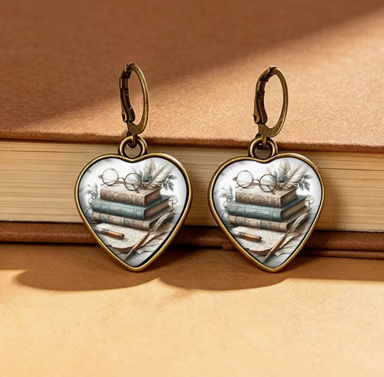 Vintage book lover heart-shaped dangle earrings featuring stacked antique books, reading glasses, flowers and antique bronze-tone leverback closures