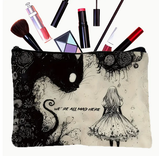 Makeup pouch with Alice in Wonderland design and makeup items on a white background