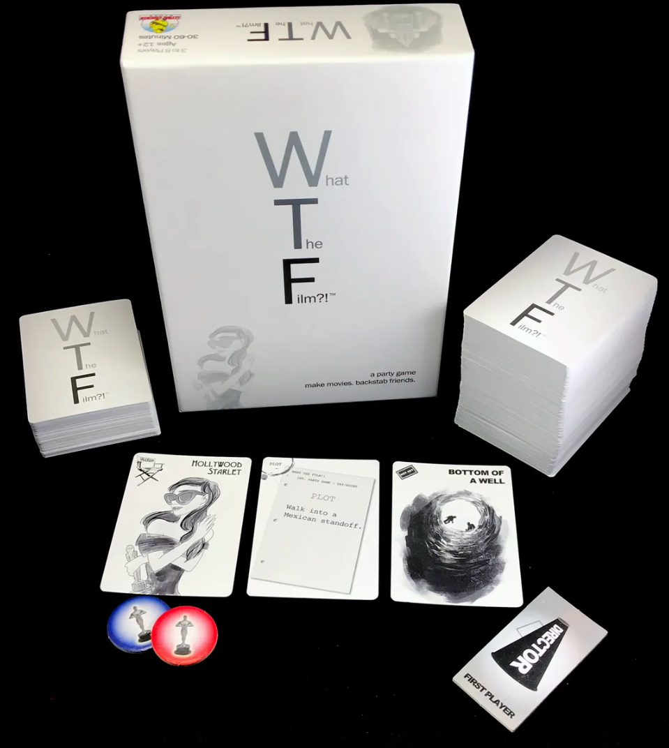 What The Film party game complete contents including cards, player tokens, and director card.