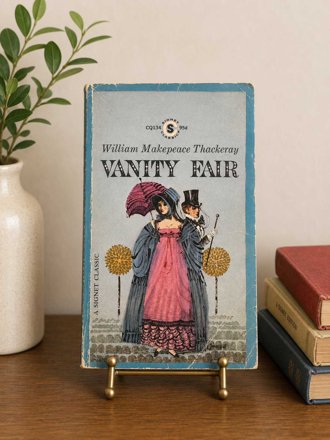 Vintage Signet Classics paperback edition of Vanity Fair by William Makepeace Thackeray featuring illustrated Victorian cover art